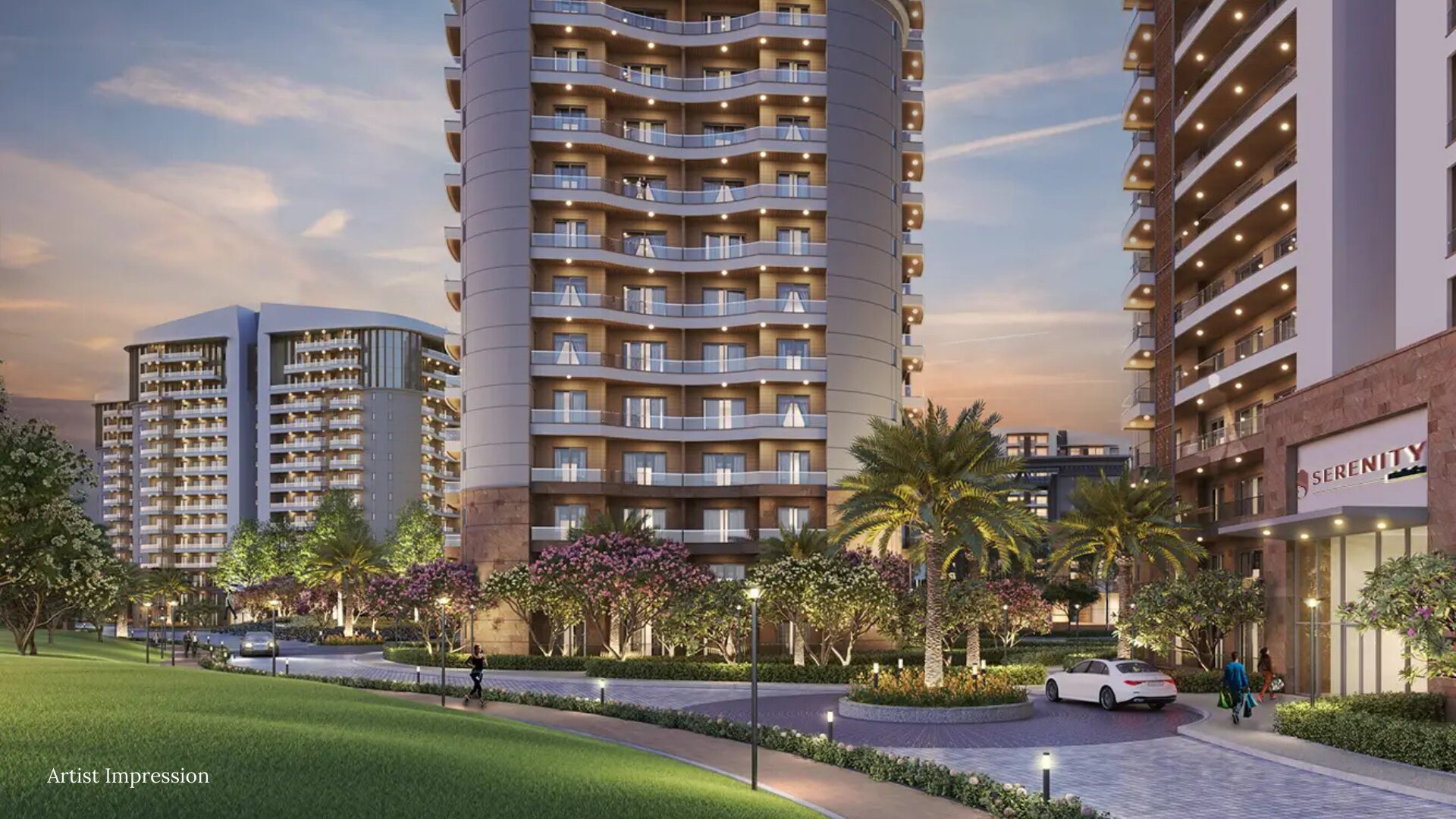 A street-level view of Rishita Serenity's residential towers at dusk.
