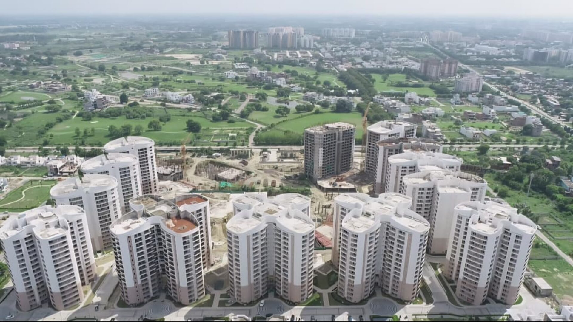 An aerial view of the completed Mulberry Heights complex within its surrounding neighborhood in Lucknow.
