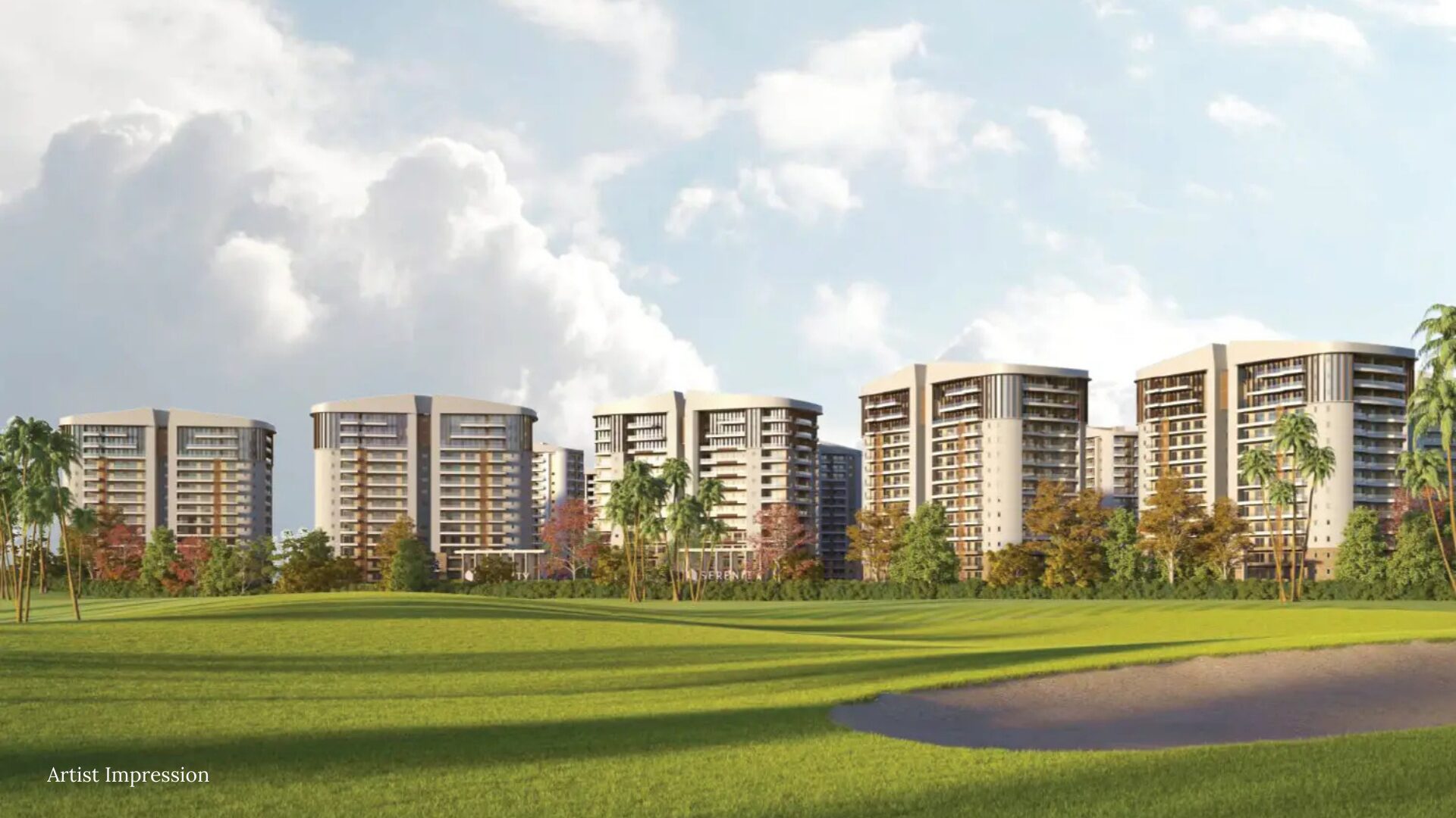 Rishita Serenity towers viewed from across the expansive green golf course.