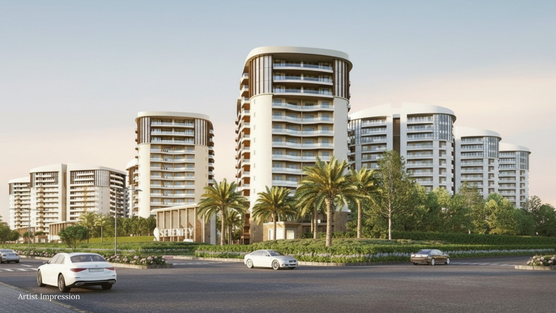 The main entrance and residential towers of Rishita Serenity on a bright, sunny day.